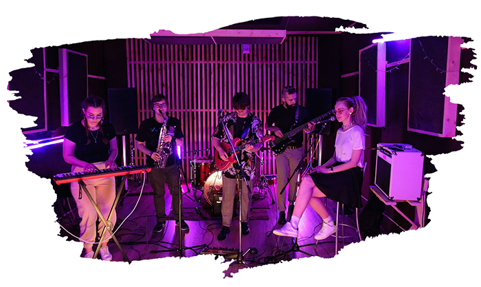 Band playing in a studio